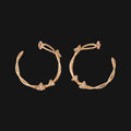 Pendientes entrelazados de 18k